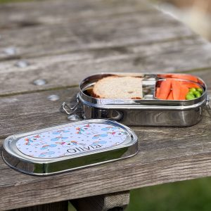 Oval matboks i stål med snacksboks